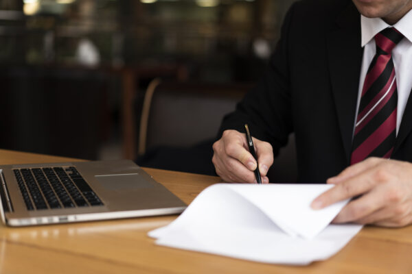 A men signing the papers